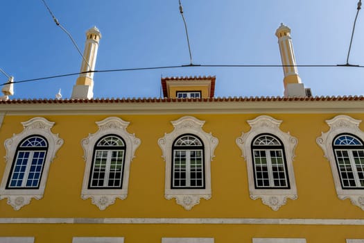 Detail of the facade of the Palace of the Count of Monte Real built in early 20th century in neo-Baroque and neo-Rococo architectural styles, in Lisbon, Portugal
