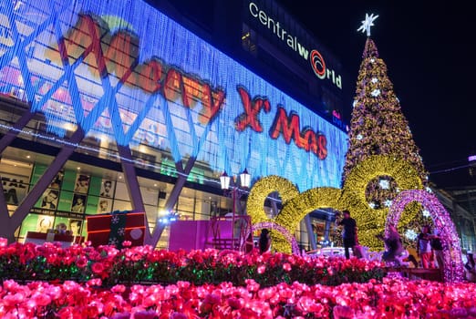 BANGKOK, THAILAND - DECEMBER 21, 2015 : Night illumination of Christmas and New Year celebration 2016 at Central World shopping mall, Ratchaprasong intersection in Bangkok, Thailand. Decorated in concept of Disneyland fairy tale
