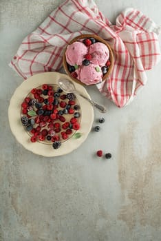 Fresh of soft ice cream or frozen yogurt with berry fruit flavours