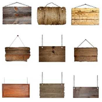 Set of hanging wooden signs on metal chains background