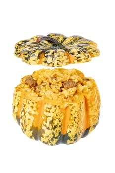 Roasted pumpkin. Close-up of baked whole pumpkin stuffed with roasted rice pot made from rice, onions, carrots, garlic, pumpkin and beef isolated on a white background.