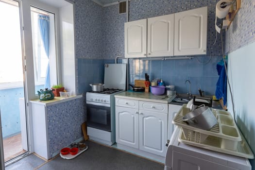 The interior of the old kitchen with access to the balcony