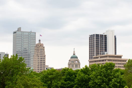 Fort Wayne, city in the state of Indiana, USA, the skyline emerges behind trees