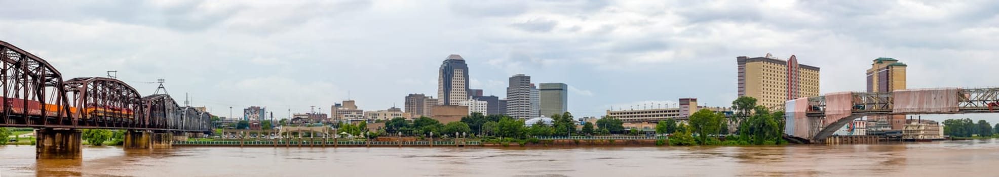 Shreveport, city in the state of Louisiana, United States, as seen across the Red River, during overcast and rain