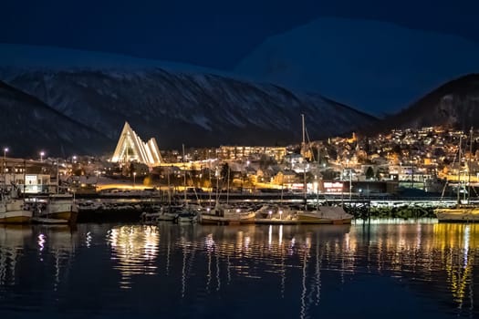 Tromso Harbour and Arctic Cathedral at night, Norway