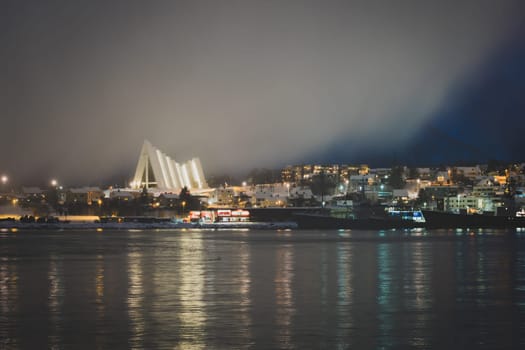 Tromso Harbour and Arctic Cathedral at night, Norway