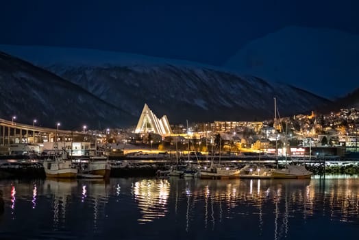 Tromso Harbour and Arctic Cathedral at night, Norway
