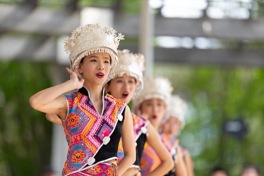 Columbus, Ohio, USA - May 26, 2019: Columbus Asian Festival, Franklin Park, Chinese Dancers wearing traditional clothing performing traditional dances.