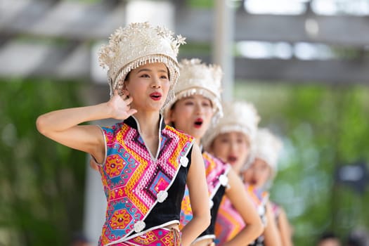 Columbus, Ohio, USA - May 26, 2019: Columbus Asian Festival, Franklin Park, Chinese Dancers wearing traditional clothing performing traditional dances.