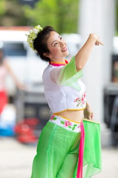 Columbus, Ohio, USA - May 26, 2019: Columbus Asian Festival, Franklin Park, Chinese Dancers wearing traditional chinese clothing, performing a display of chinese traditional dancing