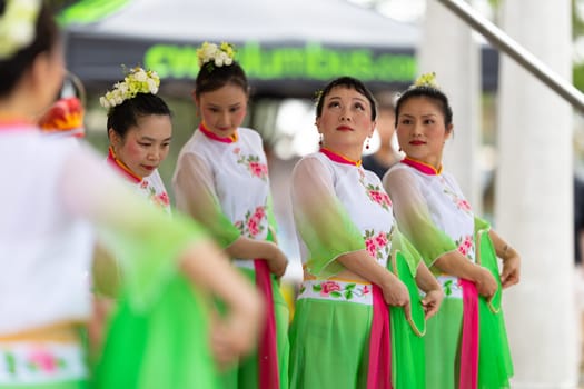 Columbus, Ohio, USA - May 26, 2019: Columbus Asian Festival, Franklin Park, Chinese Dancers wearing traditional chinese clothing, performing a display of chinese traditional dancing
