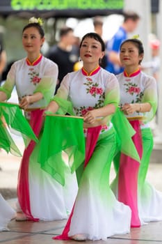 Columbus, Ohio, USA - May 26, 2019: Columbus Asian Festival, Franklin Park, Chinese Dancers wearing traditional chinese clothing, performing a display of chinese traditional dancing