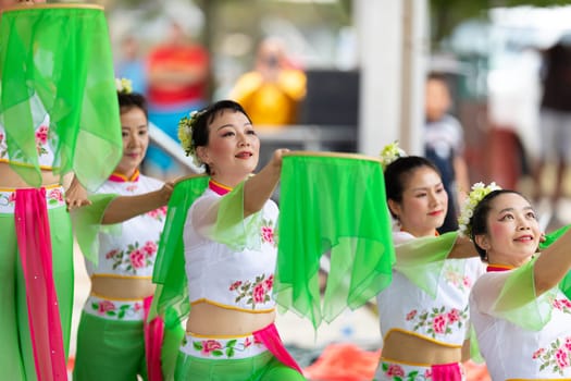 Columbus, Ohio, USA - May 26, 2019: Columbus Asian Festival, Franklin Park, Chinese Dancers wearing traditional chinese clothing, performing a display of chinese traditional dancing