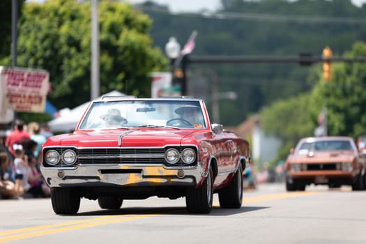 Buckhannon, West Virginia, USA - May 18, 2019: Strawberry Festival, Oldsmobile, Cutlass, classic car, going down main street during the parade