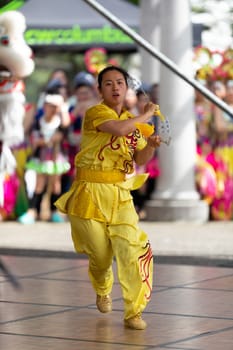 Columbus, Ohio, USA - May 26, 2019: Columbus Asian Festival, Chinese Men and women performing a display of shaolin martial arts in the amphitheater at Franklin Park