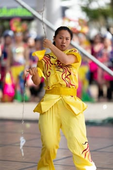 Columbus, Ohio, USA - May 26, 2019: Columbus Asian Festival, Chinese Men and women performing a display of shaolin martial arts in the amphitheater at Franklin Park
