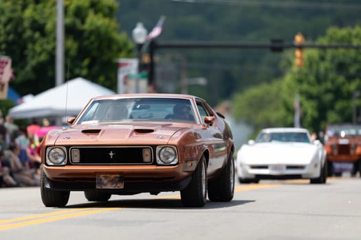 Buckhannon, West Virginia, USA - May 18, 2019: Strawberry Festival, Ford, Mustang, classic car, going down main street during the parade