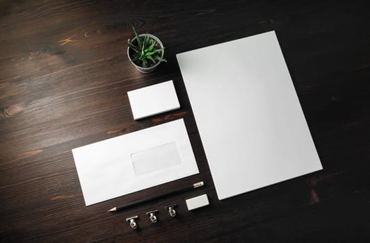 Blank stationery template on wood table background. Mockup for branding identity.