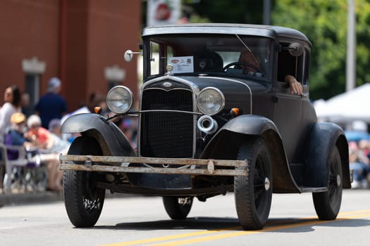 Buckhannon, West Virginia, USA - May 18, 2019: Strawberry Festival, Ford Model A, classic car, going down main street during the parade
