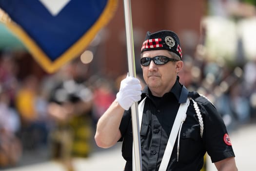 Buckhannon, West Virginia, USA - May 18, 2019: Strawberry Festival, The West Virginia Highlanders from Davis and Elkins College, performing at the parade