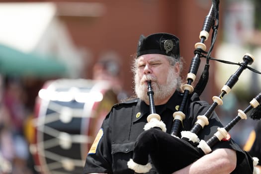 Buckhannon, West Virginia, USA - May 18, 2019: Strawberry Festival, The West Virginia Highlanders from Davis and Elkins College, performing at the parade