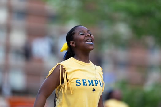 Louisville, Kentucky, USA - May 2, 2019: The Pegasus Parade, Young african american woman  dancing during the parade