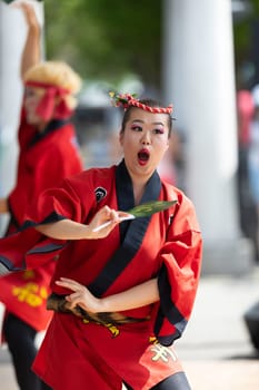 Columbus, Ohio, USA - May 26, 2019: Columbus Asian Festival, Members of Takarabune dance group from Japan, wearing traditional clothing performing traditional dances at the Amphitheater in the Franklin Park.