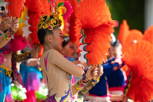 Columbus, Ohio, USA - May 26, 2019: Columbus Asian Festival, Young girls performing Hmong traditional dances, in the amphitheater at Franklin Park