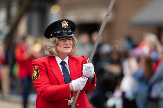 Holland, Michigan, USA - May 11, 2019: Tulip Time Parade, Members of the American Legion Band performing during the parade