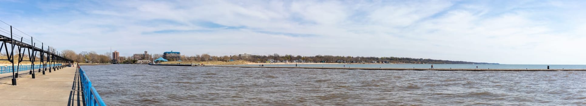 St. Joseph, Michigan, USA - May 4, 2019: View of the piers protecting the harbor entrance into the St Joseph River