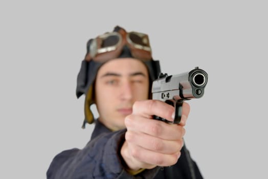 tank driver Soviet soldier fires with handgun