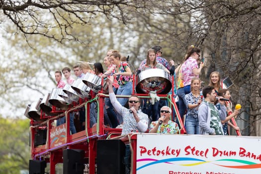 Holland, Michigan, USA - May 11, 2019: Tulip Time Parade, Members of the Petoskey Steel Drum Band, performing during the parade