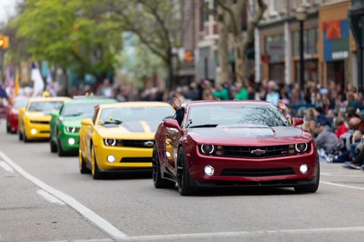 Holland, Michigan, USA - May 11, 2019: Tulip Time Parade, A group of Camaros going down the road during the parade