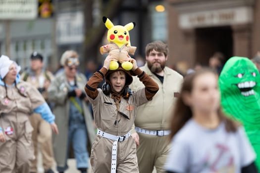 Holland, Michigan, USA - May 11, 2019: Tulip Time Parade, People dress up as Ghostbusters, promoting the Tulip City Ghostbusters during the parade