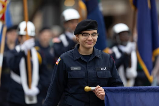 Holland, Michigan, USA - May 11, 2019: Tulip Time Parade, Members of the Michigan Youth Challenge Academy, escorting the American flag during the parade