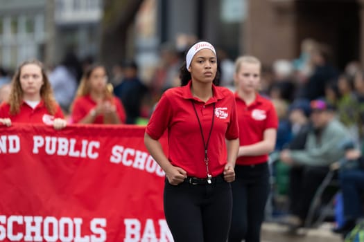 Holland, Michigan, USA - May 11, 2019: Tulip Time Parade, The Holland Public Schools Middle Schools Band, Performing at the parade