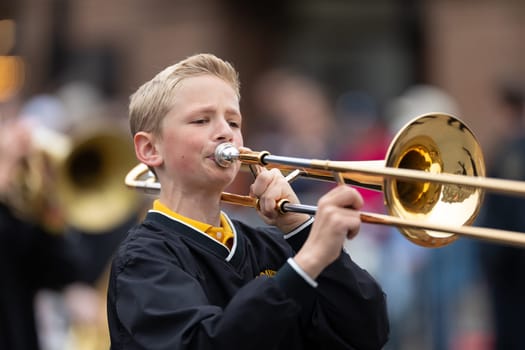 Holland, Michigan, USA - May 11, 2019: Tulip Time Parade, Members of the Hamilton Middle School marching band, performing during the parade