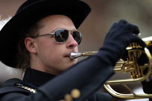 Holland, Michigan, USA - May 11, 2019: Tulip Time Parade, Members of the Wildcat Marching band, performing during the parade