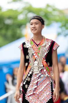 Grand Rapids, Michigan, USA - June 15, 2019: Asian Pacific Festival, hmong people wearing traditional clothing at a fashion display  in the Rosa Parks Circle