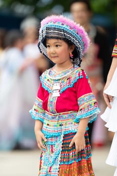 Grand Rapids, Michigan, USA - June 15, 2019: Asian Pacific Festival, hmong people wearing traditional clothing at a fashion display  in the Rosa Parks Circle
