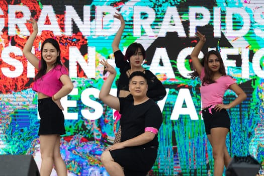 Grand Rapids, Michigan, USA - June 15, 2019: Asian Pacific Festival, Young asians dancing Hip Hop during the festival at the Rosa Parks