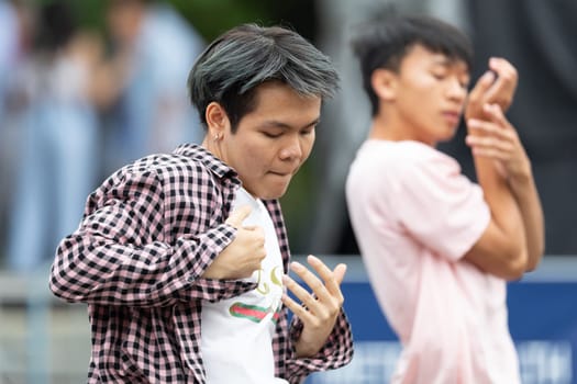 Grand Rapids, Michigan, USA - June 15, 2019: Young Men and Women, performing modern K-POP dance during the asian festival at Rosa Park