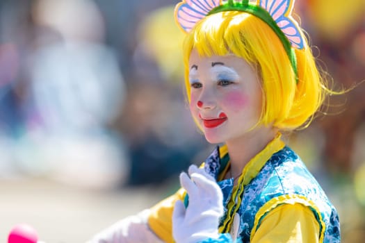 Benton Harbor, Michigan, USA - May 4, 2019: Blossomtime Festival Grand Floral Parade, Michiana Clowns riding bicycles during the parade