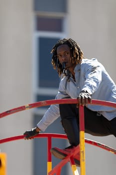 Benton Harbor, Michigan, USA - May 4, 2019: Blossomtime Festival Grand Floral Parade, Sam the wheeler riding a giant wheel at the parade