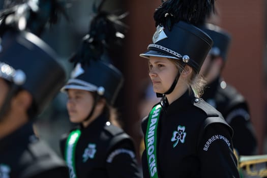 Benton Harbor, Michigan, USA - May 4, 2019: Blossomtime Festival Grand Floral Parade, Members of the Berrien Springs High School, performing during the parade