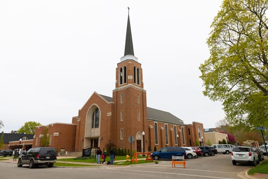 Holland, Michigan, USA - May 11, 2019: The Central Avenue Christian Reformed Church, infront of the Centennial Park