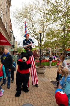Holland, Michigan, USA - May 11, 2019: Street performer entertaining locals and tourist during the tulip time festival