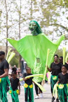 Cleveland, Ohio, USA - June 8, 2019: Parade the Circle, people wearing colorful abstract outfits during the parade