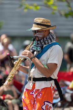 Cleveland, Ohio, USA - June 8, 2019: Parade the Circle, Man playing the clarinet