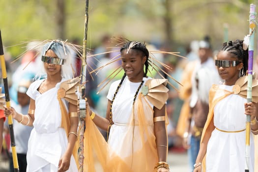 Cleveland, Ohio, USA - June 8, 2019: Parade the Circle, people wearing colorful abstract outfits during the parade